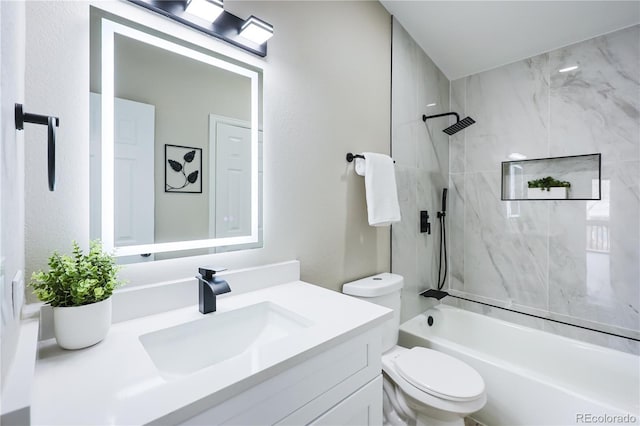 bathroom with shower / washtub combination, toilet, and vanity