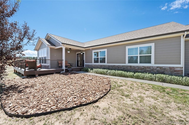 view of front of home with a deck