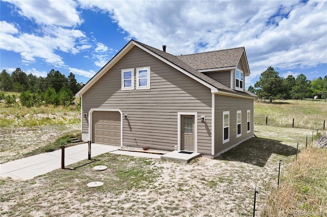 exterior space featuring a garage