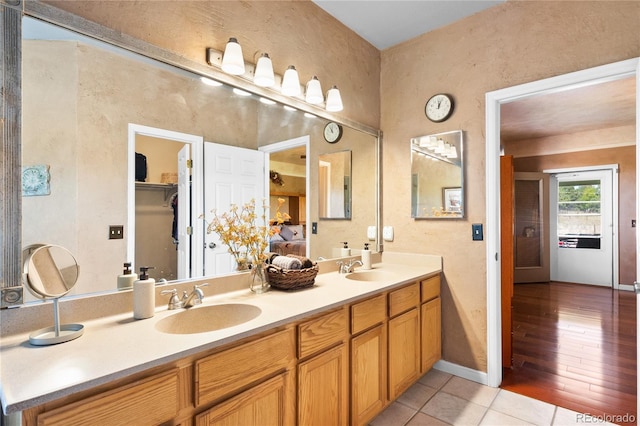 bathroom featuring tile patterned floors and vanity