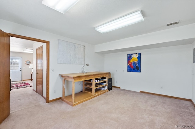 basement with light colored carpet