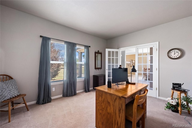 carpeted office space with french doors