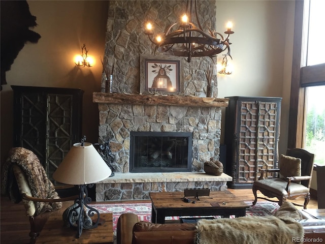 59 Club House Road 1/2Quarter Share D, Breckenridge, CO 80424 - living room with wood finished floors, a fireplace, and a chandelier