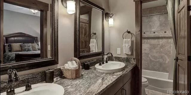 59 Club House Road 1/2Quarter Share D, Breckenridge, CO 80424 - full bathroom featuring double vanity, ensuite bath, and shower / bath combo with shower curtain