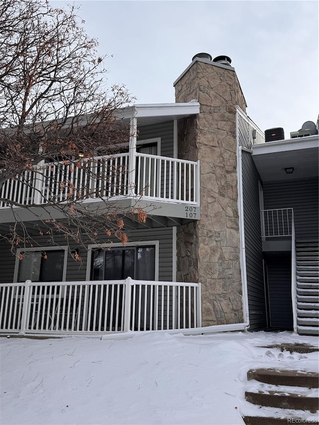 view of snow covered property