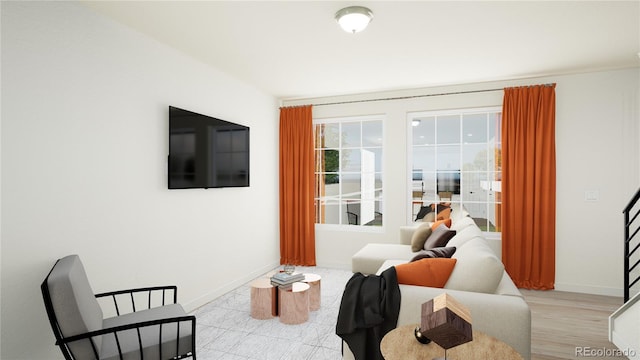 sitting room featuring light hardwood / wood-style flooring