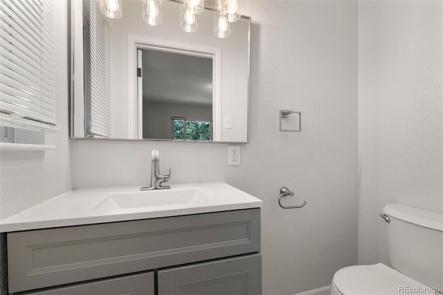 2963 S Vrain St, Denver, CO 80236 - bathroom with vanity and toilet