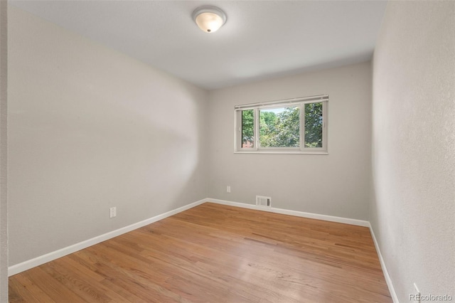 2963 S Vrain St, Denver, CO 80236 - spare room with light wood-style flooring