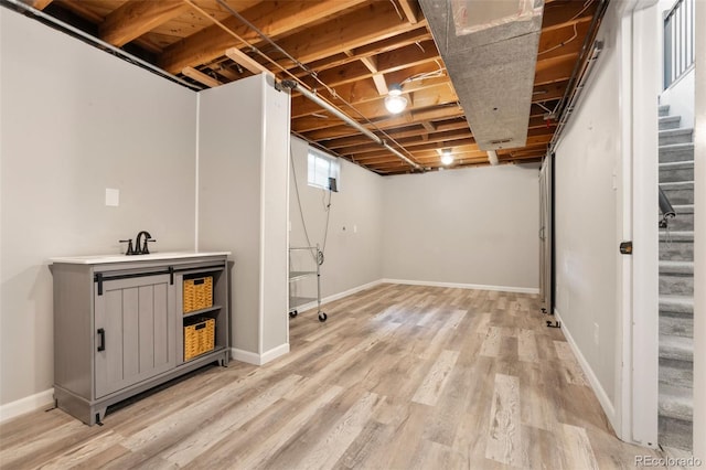 2963 S Vrain St, Denver, CO 80236 - finished below grade area with stairs and light wood-style flooring
