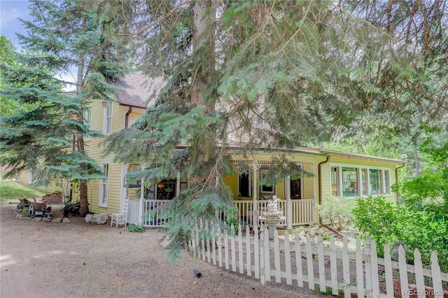 5975 Wellington Rd, Cascade, CO 80809 - victorian home with a porch