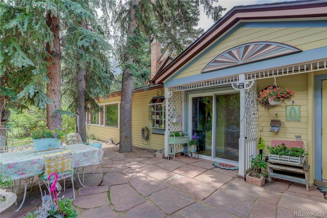 5975 Wellington Rd, Cascade, CO 80809 - view of patio featuring outdoor dining space