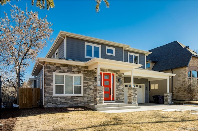 view of front facade with a front lawn and a garage