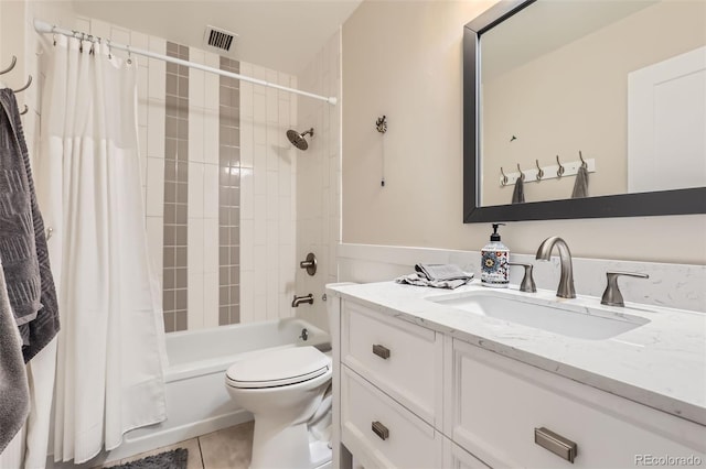 3144 S Wheeling Way Unit 401, Aurora, CO 80014 - bathroom featuring shower / tub combo with curtain, toilet, tile patterned floors, and vanity
