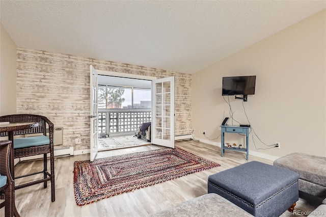 3144 S Wheeling Way Unit 401, Aurora, CO 80014 - living room featuring baseboard heating, wood finished floors, vaulted ceiling, a textured ceiling, and baseboards