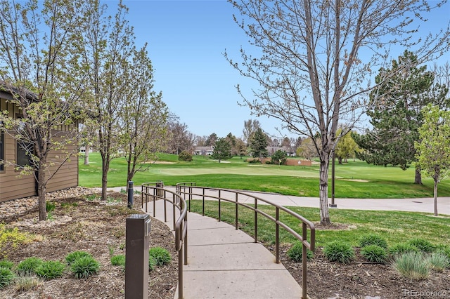 3144 S Wheeling Way Unit 401, Aurora, CO 80014 - view of home's community with a lawn and view of golf course