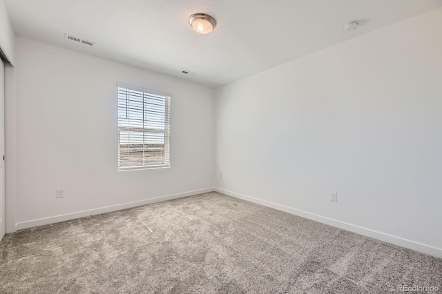 2190 S Haleyville Way, Aurora, CO 80018 - carpeted empty room featuring a smoke detector and baseboards