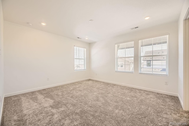 2190 S Haleyville Way, Aurora, CO 80018 - carpeted spare room featuring baseboards and recessed lighting