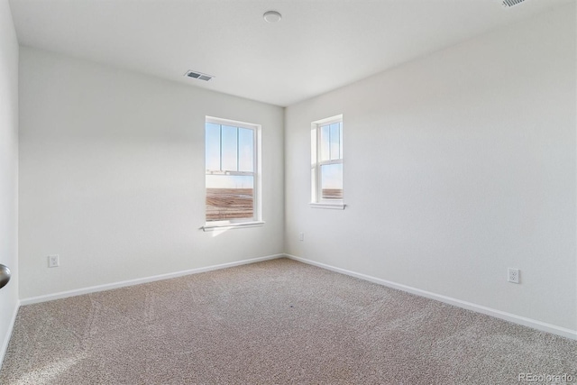 view of carpeted spare room