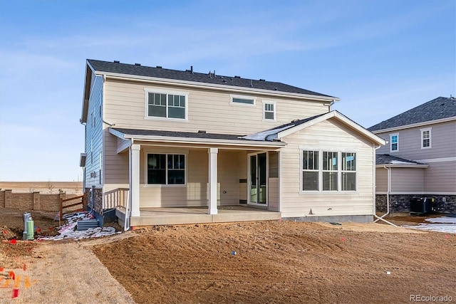 back of property with a patio area