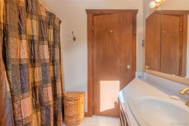 bathroom featuring tile patterned floors and sink