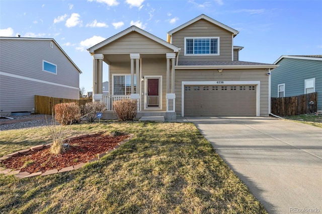 view of front of property featuring driveway, covered porch, fence, and a front lawn