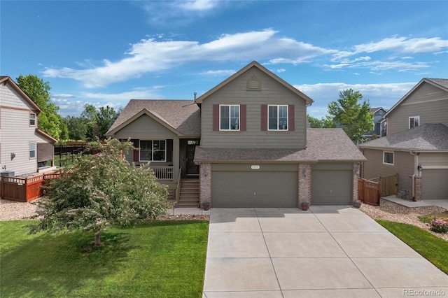 view of front facade featuring a garage and a front lawn