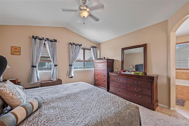 carpeted bedroom with lofted ceiling and ceiling fan