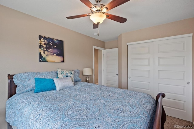 bedroom with a closet, ceiling fan, and carpet flooring