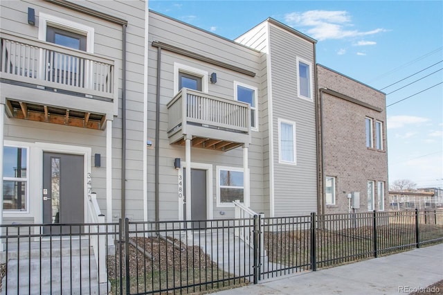 view of property featuring a fenced front yard