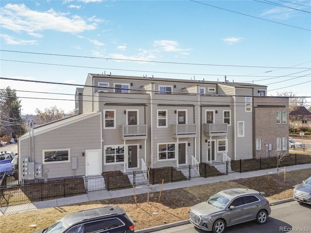 view of property featuring a fenced front yard