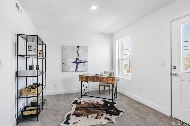 office area with visible vents, carpet flooring, and baseboards