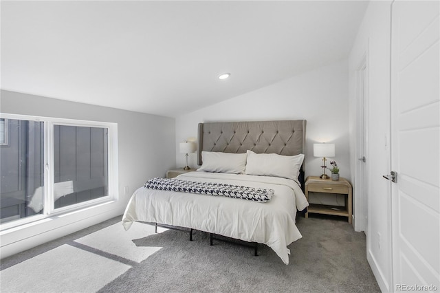 bedroom with lofted ceiling, recessed lighting, and carpet