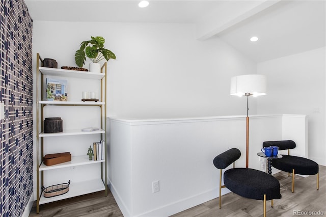 sitting room with lofted ceiling with beams, recessed lighting, and wood finished floors