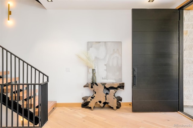 entryway with light hardwood / wood-style flooring