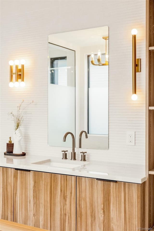 bathroom featuring backsplash and vanity