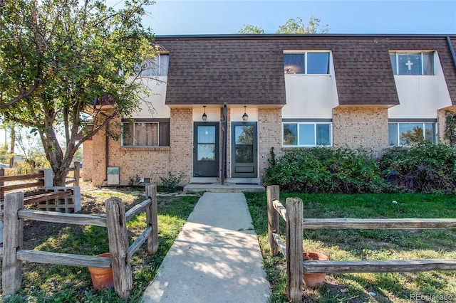 view of property with a front yard