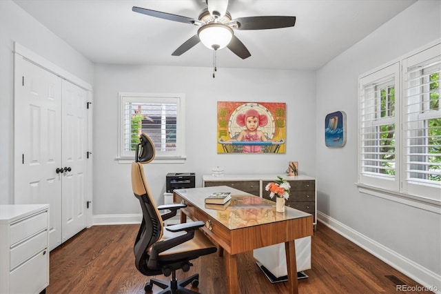 home office with baseboards, dark wood finished floors, and a ceiling fan