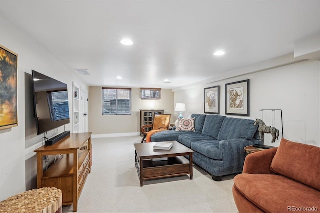 living area featuring baseboards, carpet flooring, visible vents, and recessed lighting