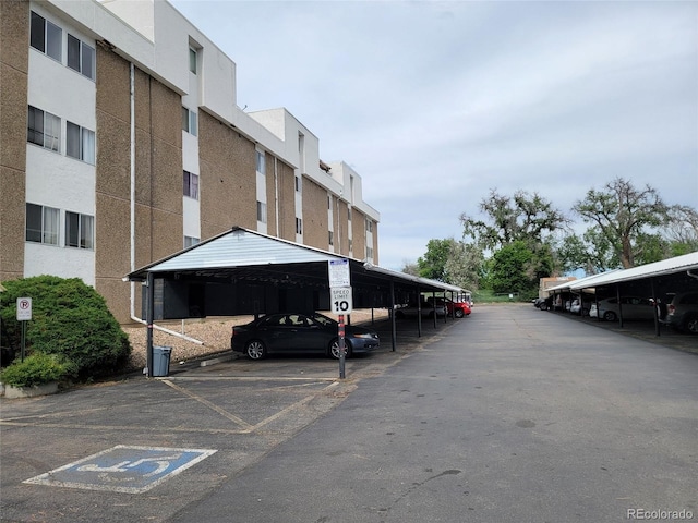 384 S Ironton St Unit 407, Aurora, CO 80012 - view of partially covered parking lot