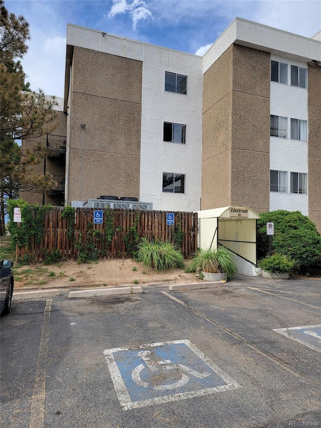 384 S Ironton St Unit 407, Aurora, CO 80012 - view of property with uncovered parking