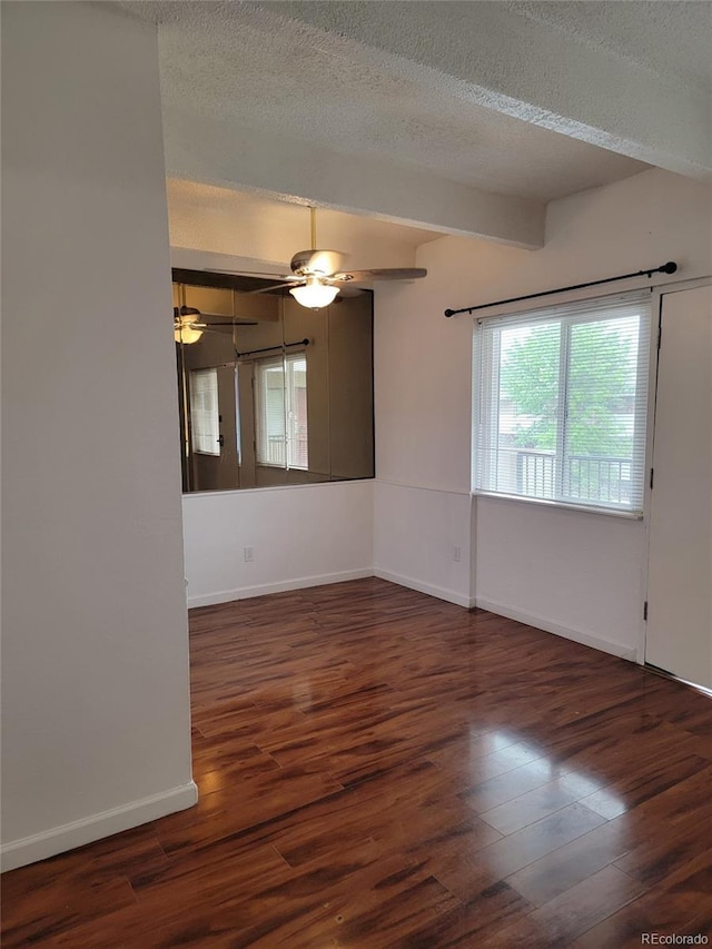 384 S Ironton St Unit 407, Aurora, CO 80012 - unfurnished room with a textured ceiling, wood finished floors, ceiling fan, and baseboards