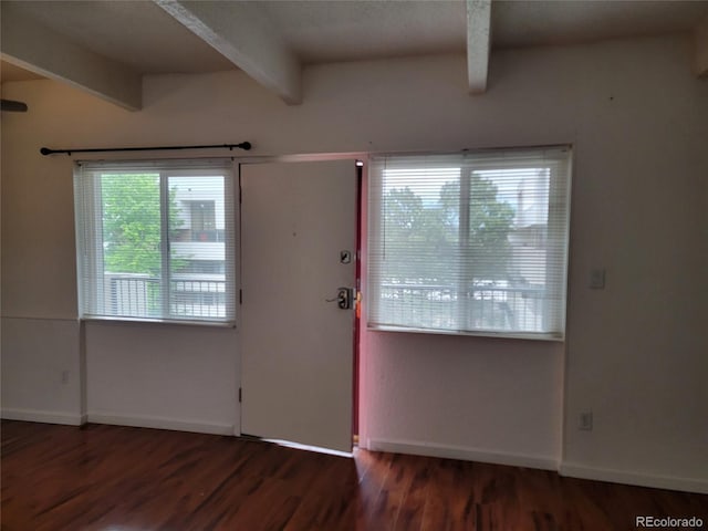384 S Ironton St Unit 407, Aurora, CO 80012 - entryway featuring beam ceiling, wood finished floors, and baseboards