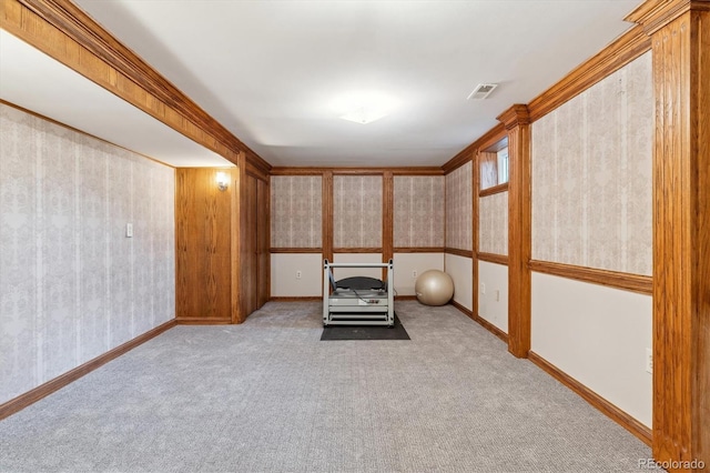 workout room featuring light colored carpet