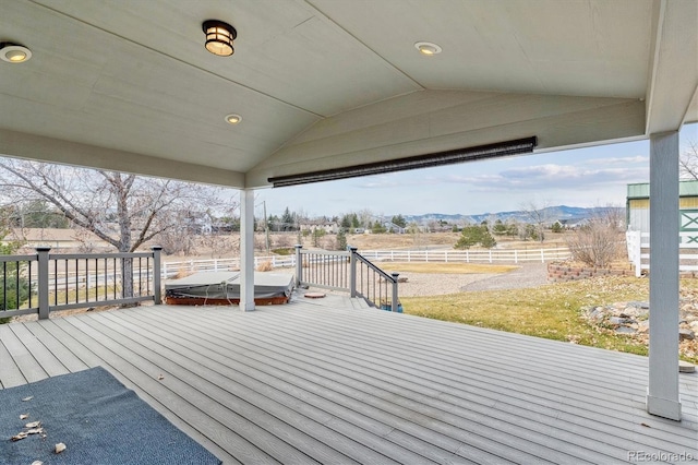 wooden deck featuring a mountain view