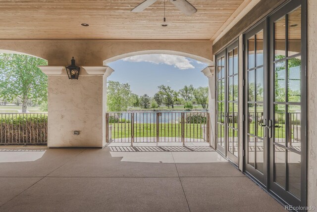 1820 Mallard Dr, Broomfield, CO 80020 - view of patio with french doors, ceiling fan, and a water view
