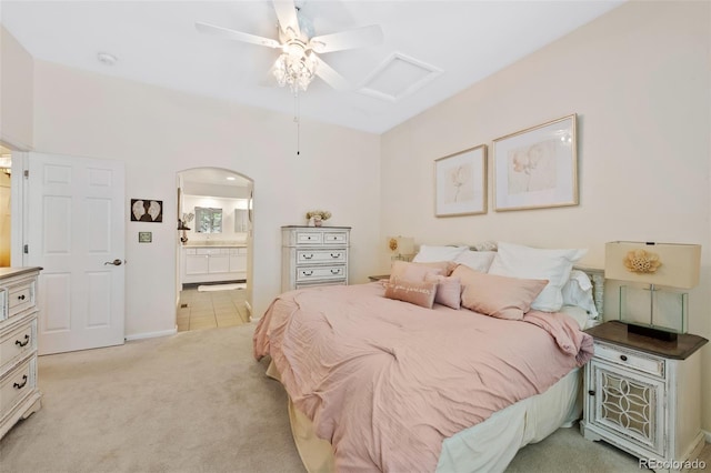 7638 S Hudson Way, Centennial, CO 80122 - bedroom featuring attic access, light carpet, ensuite bathroom, baseboards, and a ceiling fan