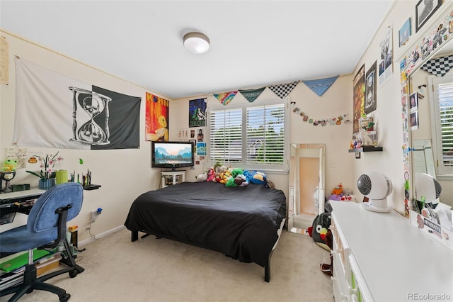 7638 S Hudson Way, Centennial, CO 80122 - bedroom with multiple windows, carpet flooring, and baseboards