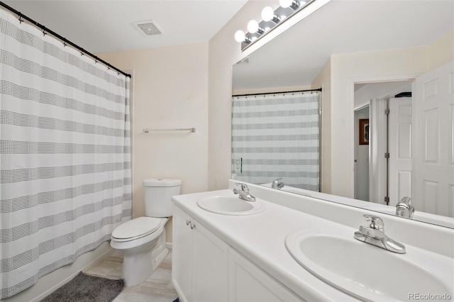 7638 S Hudson Way, Centennial, CO 80122 - full bathroom with toilet, double vanity, and a shower with curtain