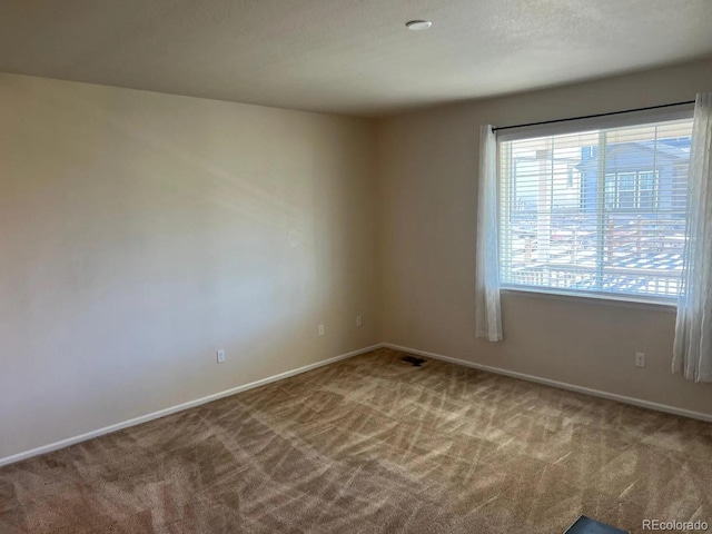 22822 E Union Cir, Aurora, CO 80015 - carpeted empty room with baseboards
