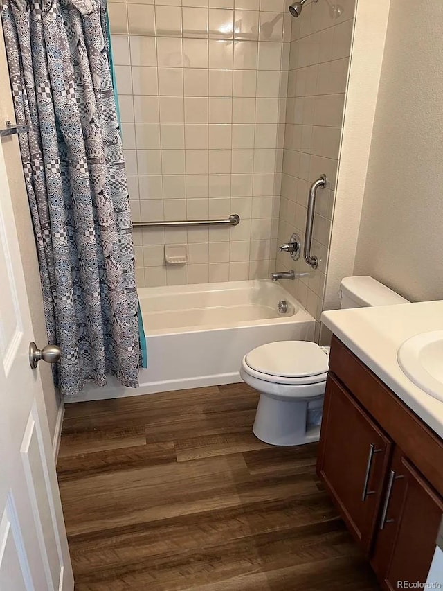 22822 E Union Cir, Aurora, CO 80015 - full bathroom featuring shower / bath combination with curtain, wood finished floors, toilet, and vanity